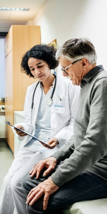 Doctor speaking with a patient in a medical office