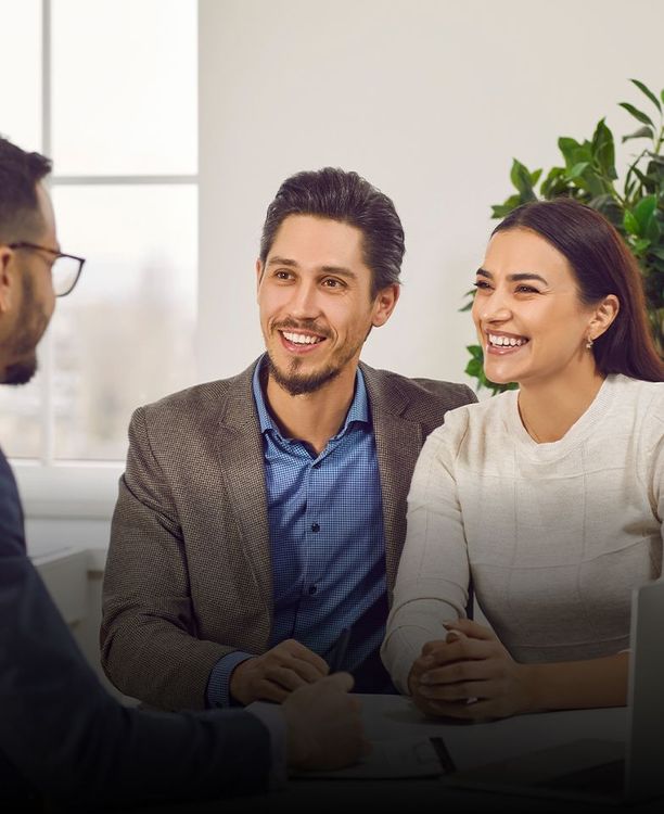 Business customers discussing vehicle financing